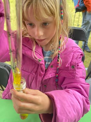 Image of child using a pipette as part of Studio Cultivate's workshop at the London National Park City anniversary